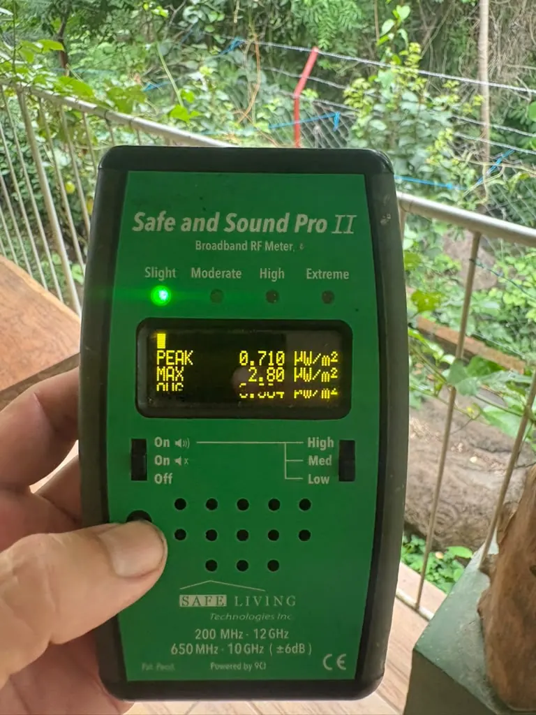 Handheld RF/EMF meter and magnetic-field meter used during on-site location assessment